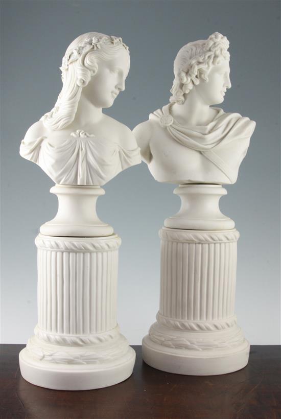 A pair of parian busts and columns, 19th century, 50cm and 48.5cm, slight losses to flowers